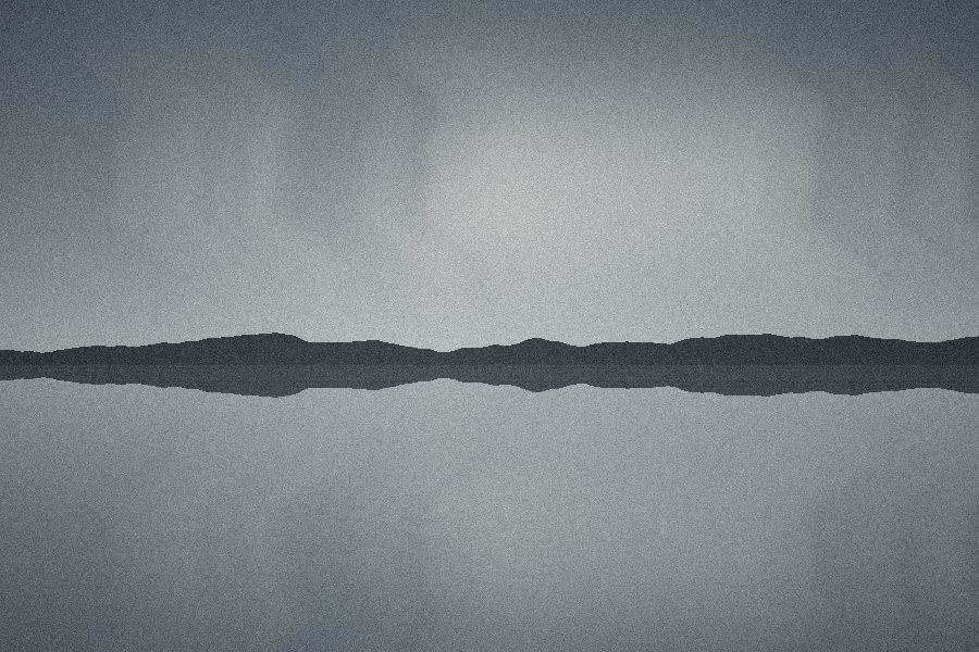 Thin dark coastline floating between grey sea and sky